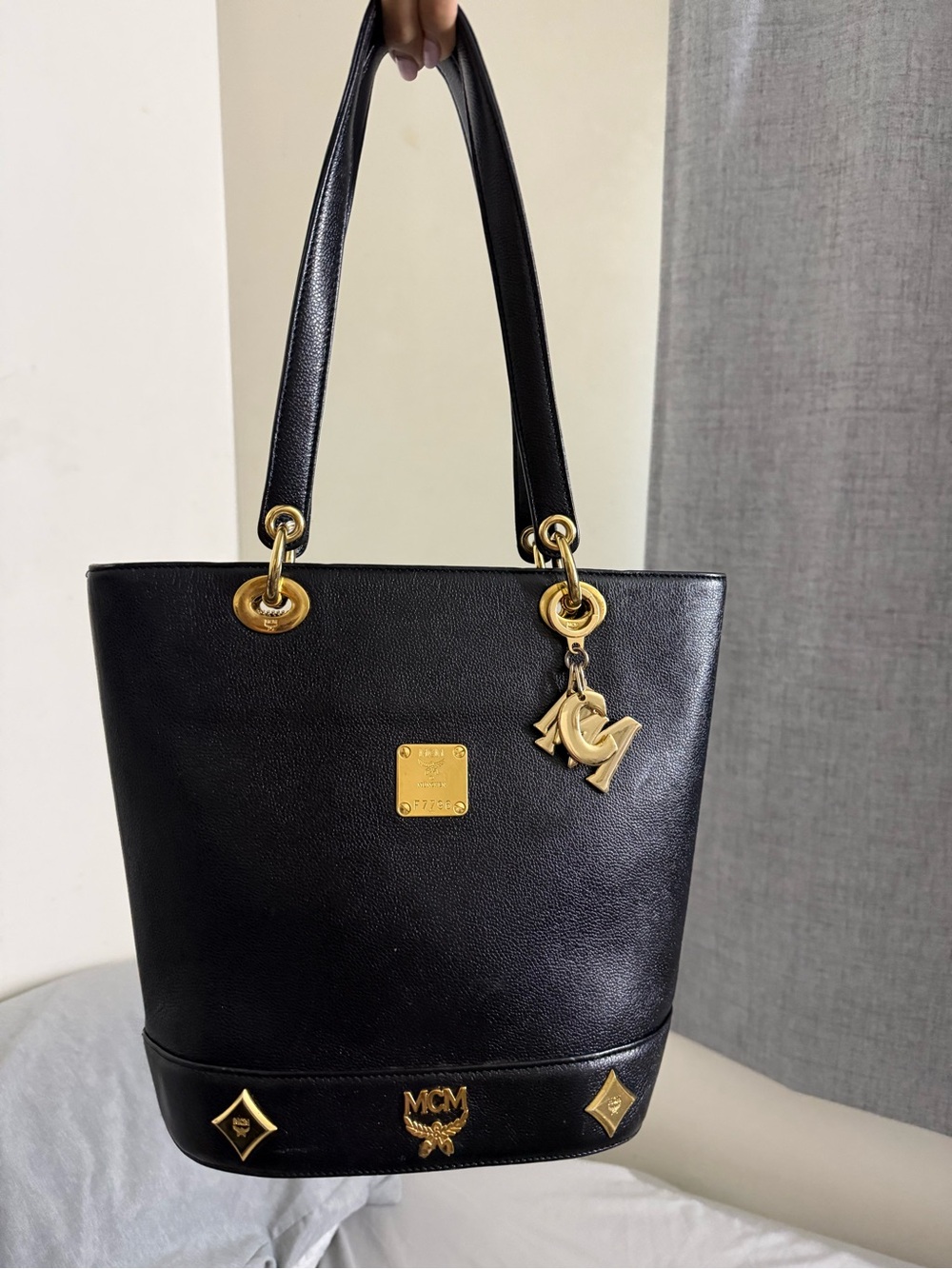 MCM Black Leather Tote with Gold Hardware and Logo Charms
